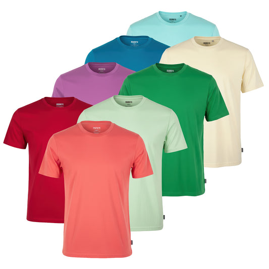 Stack of seven men's blank, solid-colored t-shirts in red, peach, light green, bright green, purple, blue, and cream.