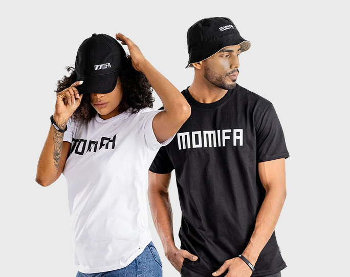 man and a woman posing, both wearing hats and t-shirts with the word "MOMIFA" printed on them.