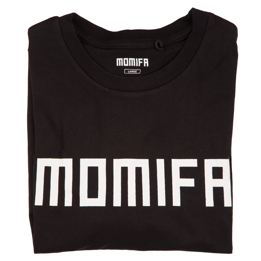 Folded black t-shirt is shown with the brand name "MOMIFA" printed in large, white block letters on the front.