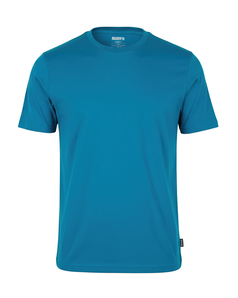 Blue t-shirt with the MOMIFA brand logo on the neckline tag and a small black tag on the lower left hem.