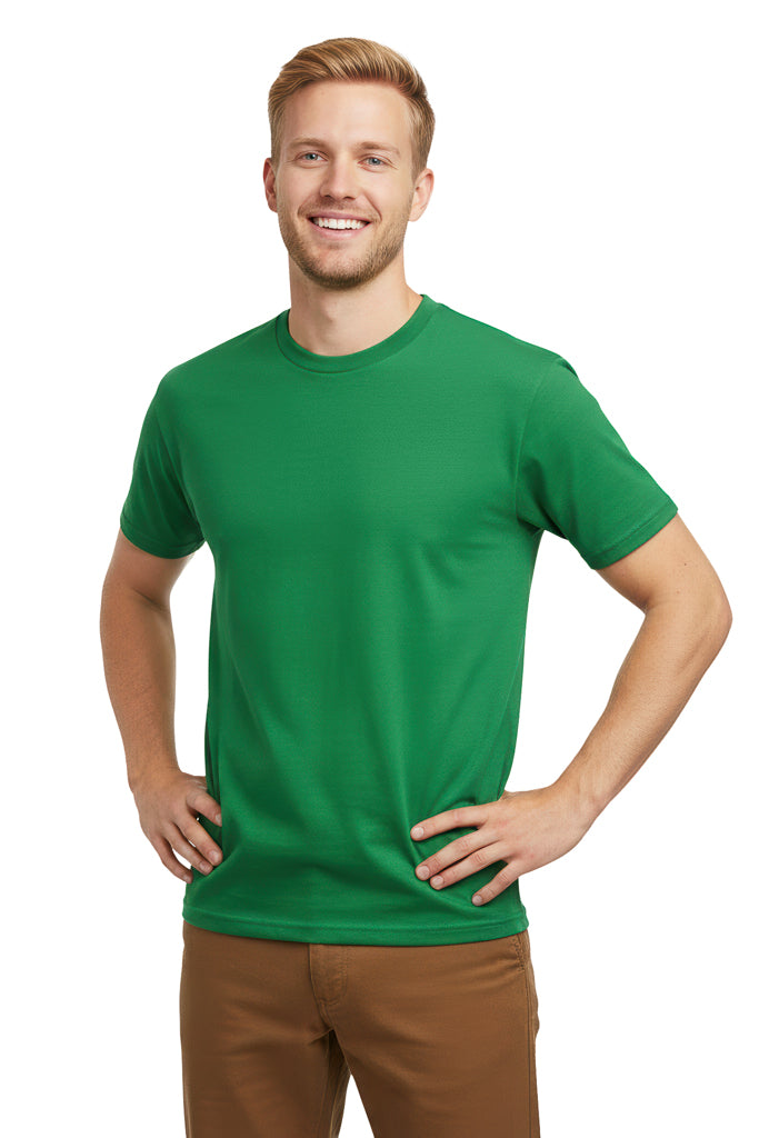 Smiling young man with blonde hair stands with his hands on his hips, wearing a blank green t-shirt and brown pants.