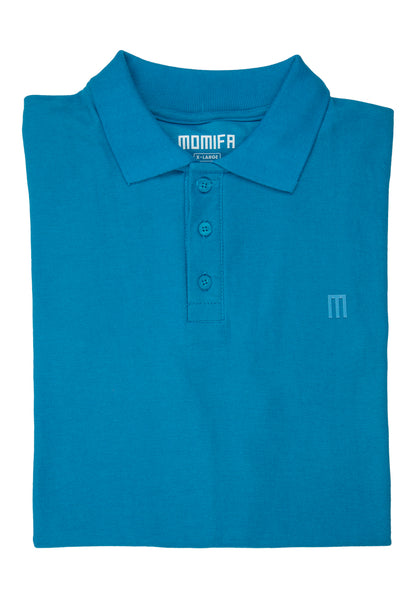 Blue polo shirt with a collar, a three-button placket, and a small tag that says ""MOMIFA X-LARGE"" on the collar area.