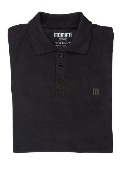 black polo shirt with a collar, a three-button placket, and a subtle ""M"" logo on the left chest, with a tag on the collar.